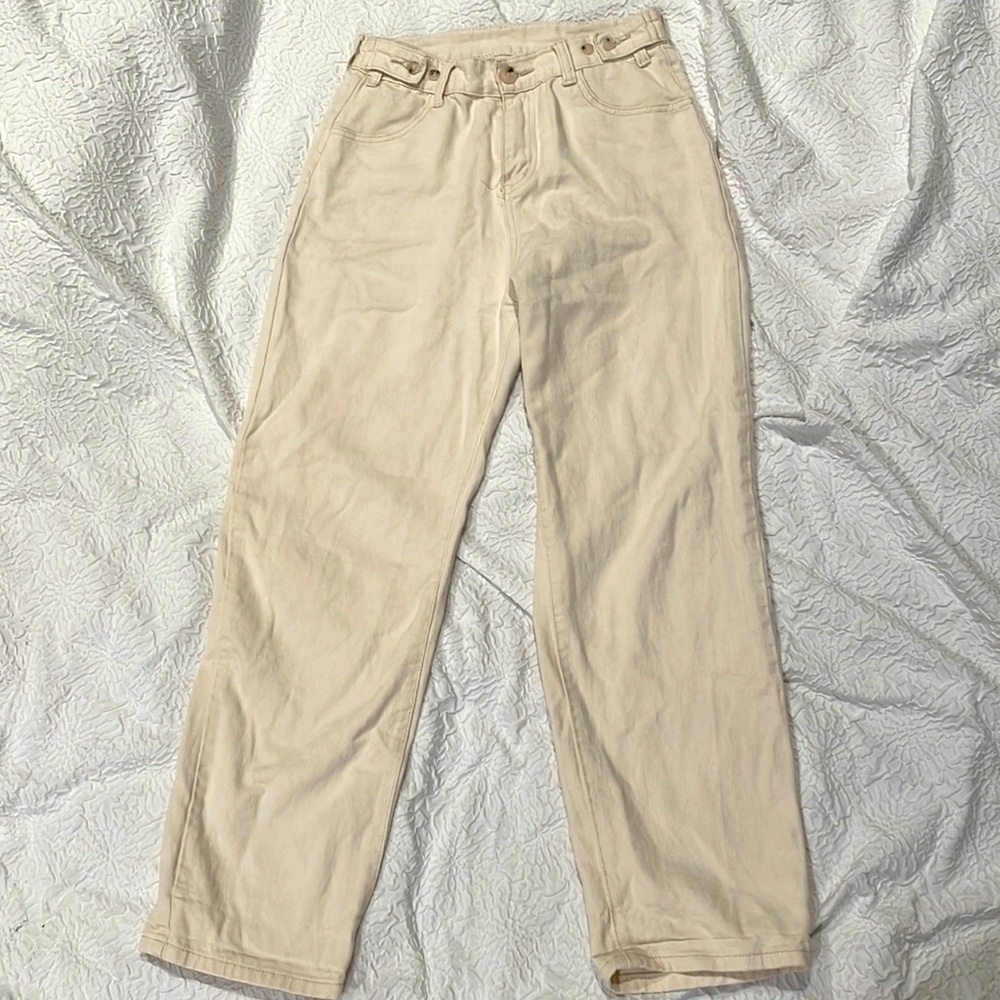 High waisted and adjustable waist cream colored jeans